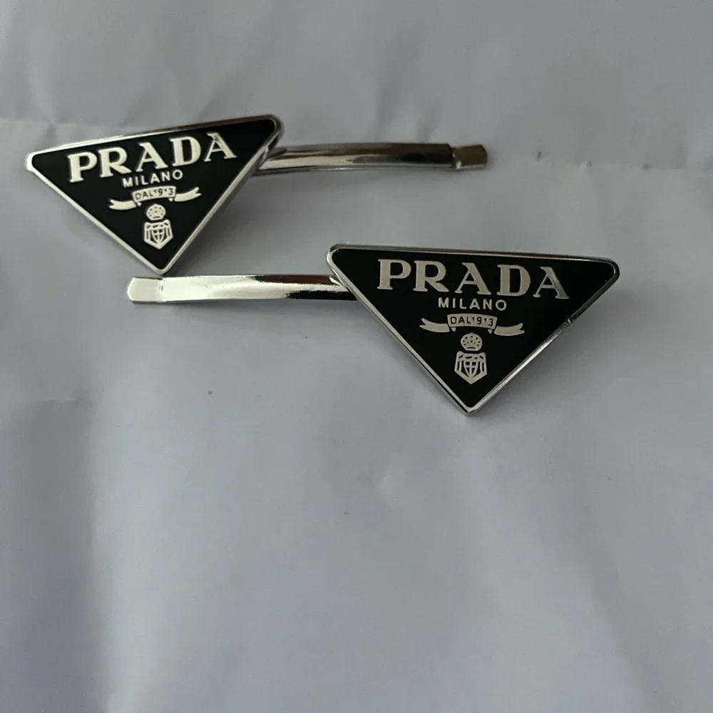 Triangular Black and Silver hair barrettes